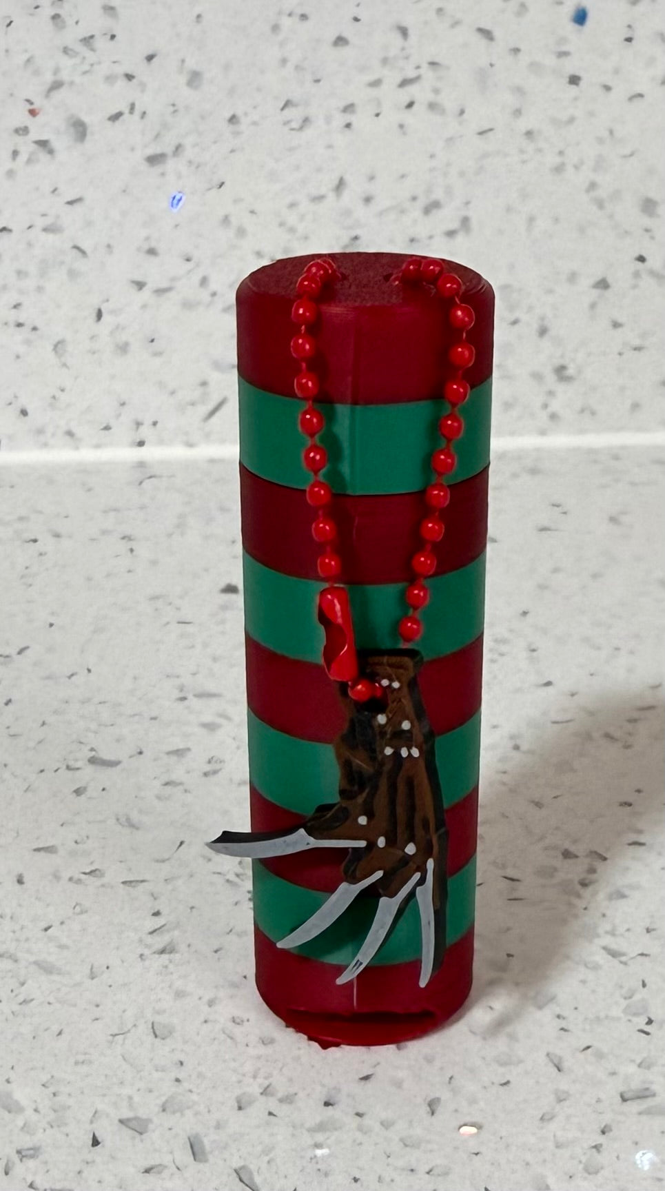 Freddy Kruger lip balm keychain holder w/ charm